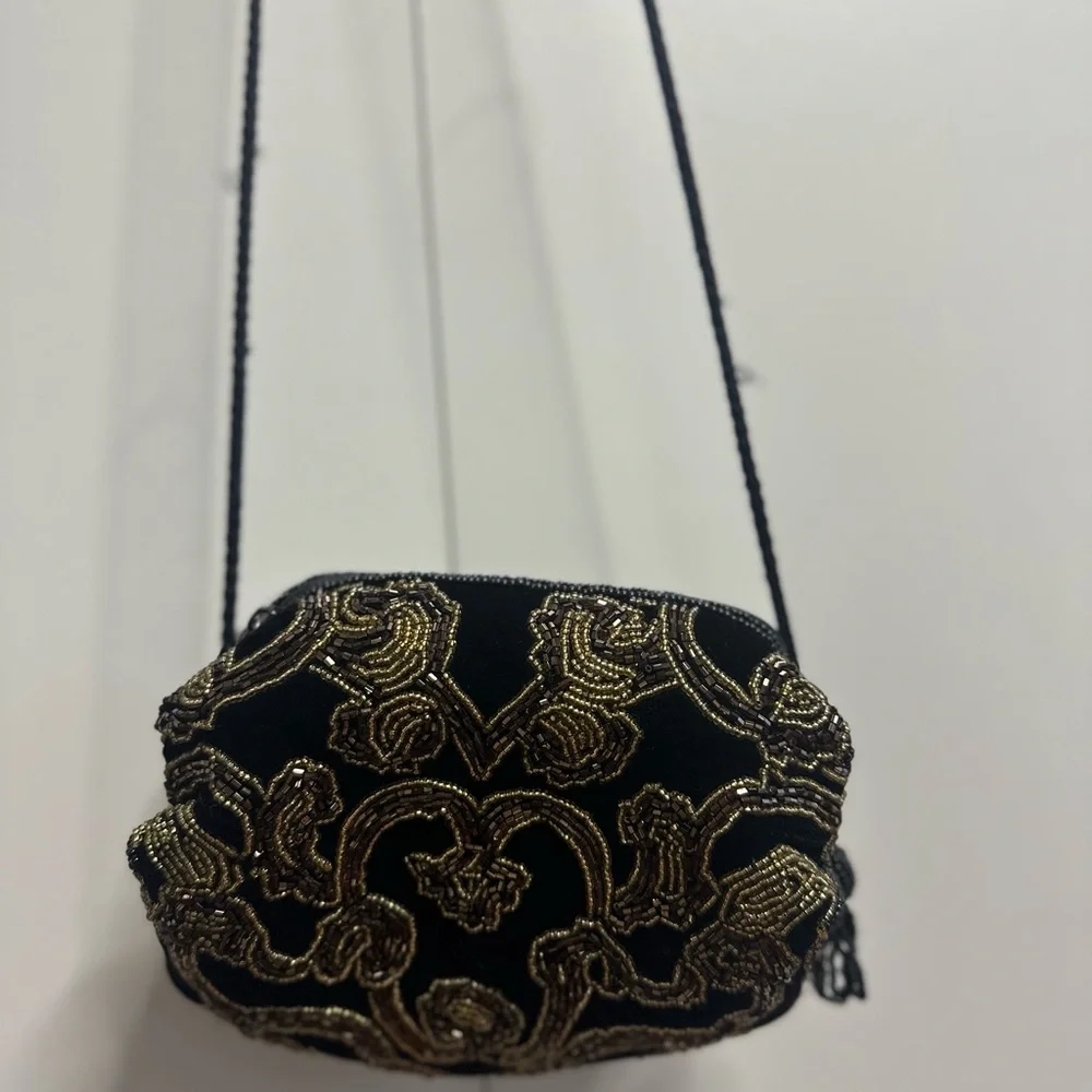 Luxurious Black and Gold Beaded Clutch